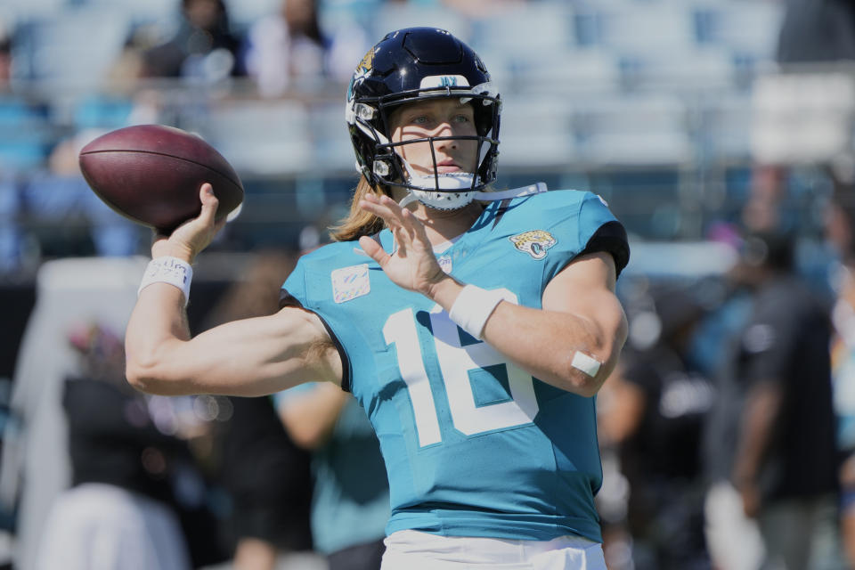 Jacksonville Jaguars quarterback Trevor Lawrence (16) warms up before an NFL football game against the Indianapolis Colts, Sunday, Oct. 15, 2023, in Jacksonville, Fla. (AP Photo/John Raoux)