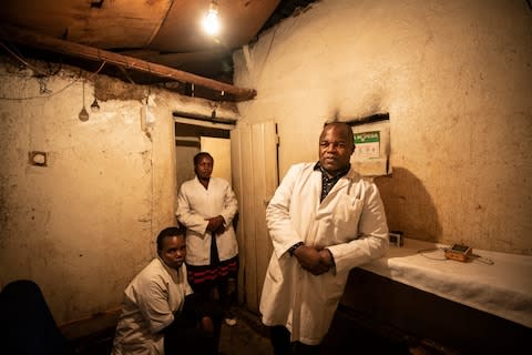 Health workers in Kibera slum, Nairobi - Credit: Simon Townsley/The Telegraph