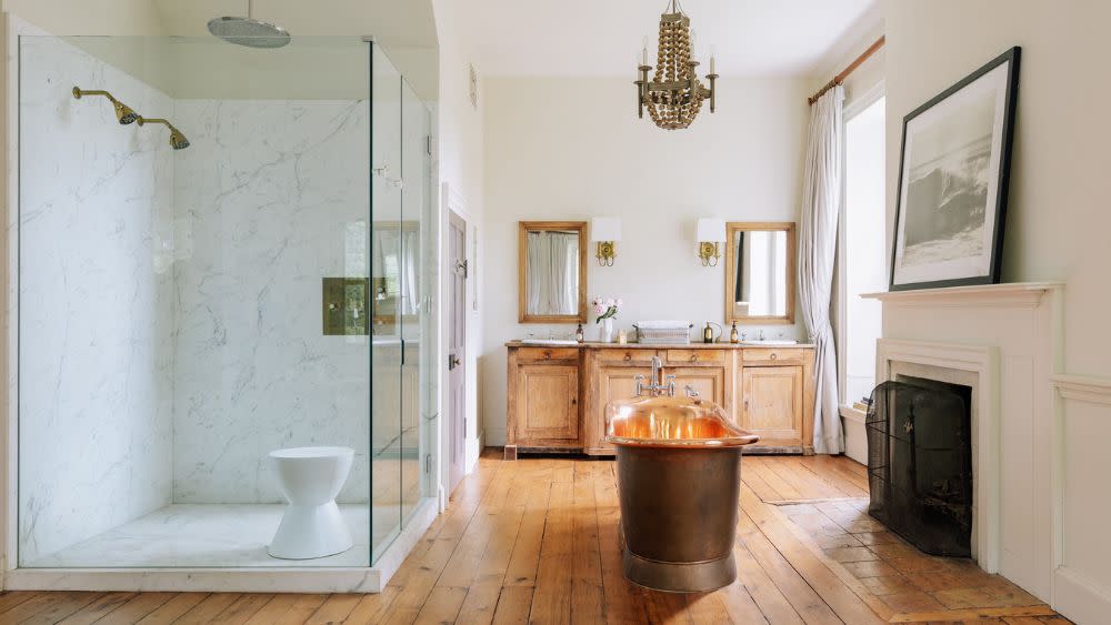 The primary bathroom in the main residence features a copper bathtub - Credit: Gabriel Zimmer / Catskill Image