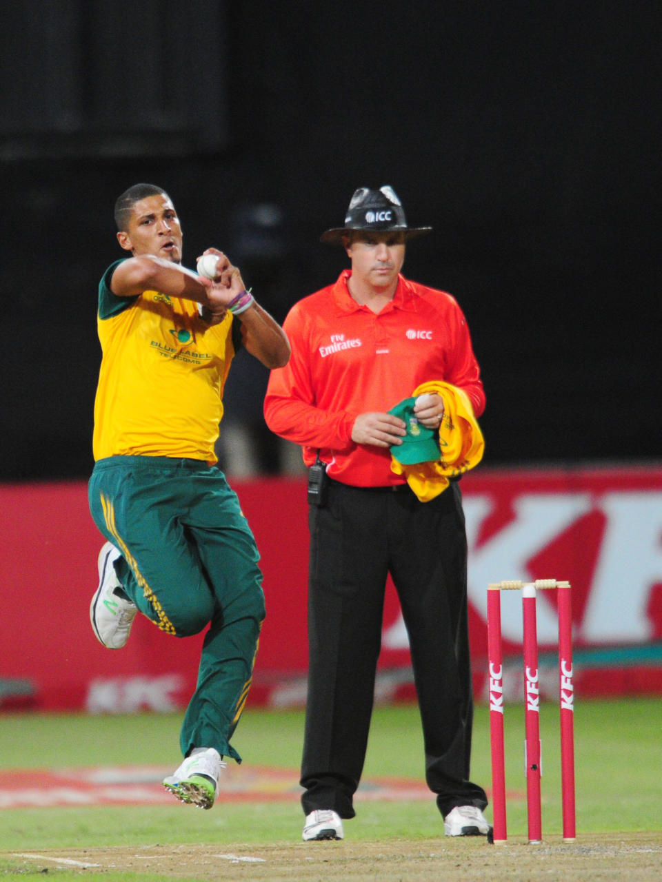 In this photo taken Wednesday, March 12, 2014, South Africa's Beuran Hendricks delivers a ball during their rain-delayed T20 cricket match against Australia in Durban, South Africa. (AP Photo)