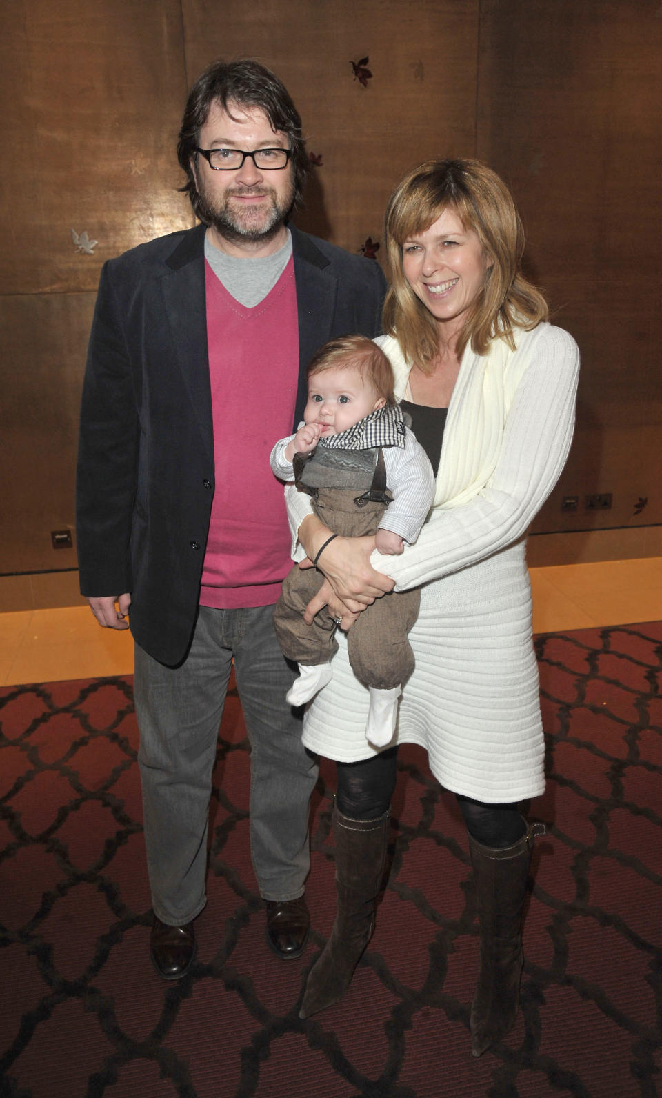 LONDON, UNITED KINGDOM - JANUARY 24: Kate Garraway, her husband Derek Draper and their son Billy attends The Princess And The Frog special event at The Mayfair Hotel on January 24, 2010 in London, England. (Photo by Jon Furniss/WireImage)