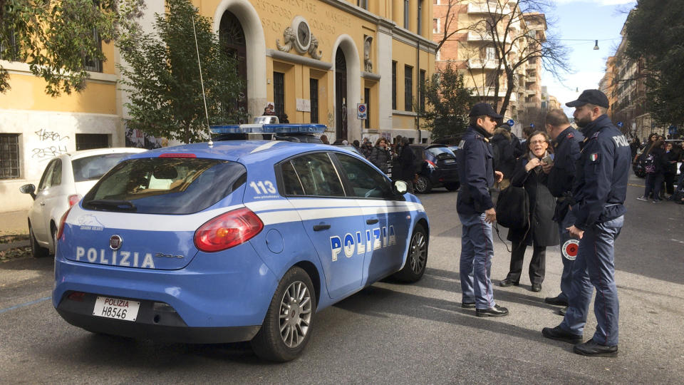 Italian police stand by an evacuated school after three earthquakes hit central Italy in the space of an hour, shaking the same region that suffered a series of deadly quakes last year, in Rome, Wednesday, Jan. 18, 2017. (AP Photo/Paolo Santalucia)