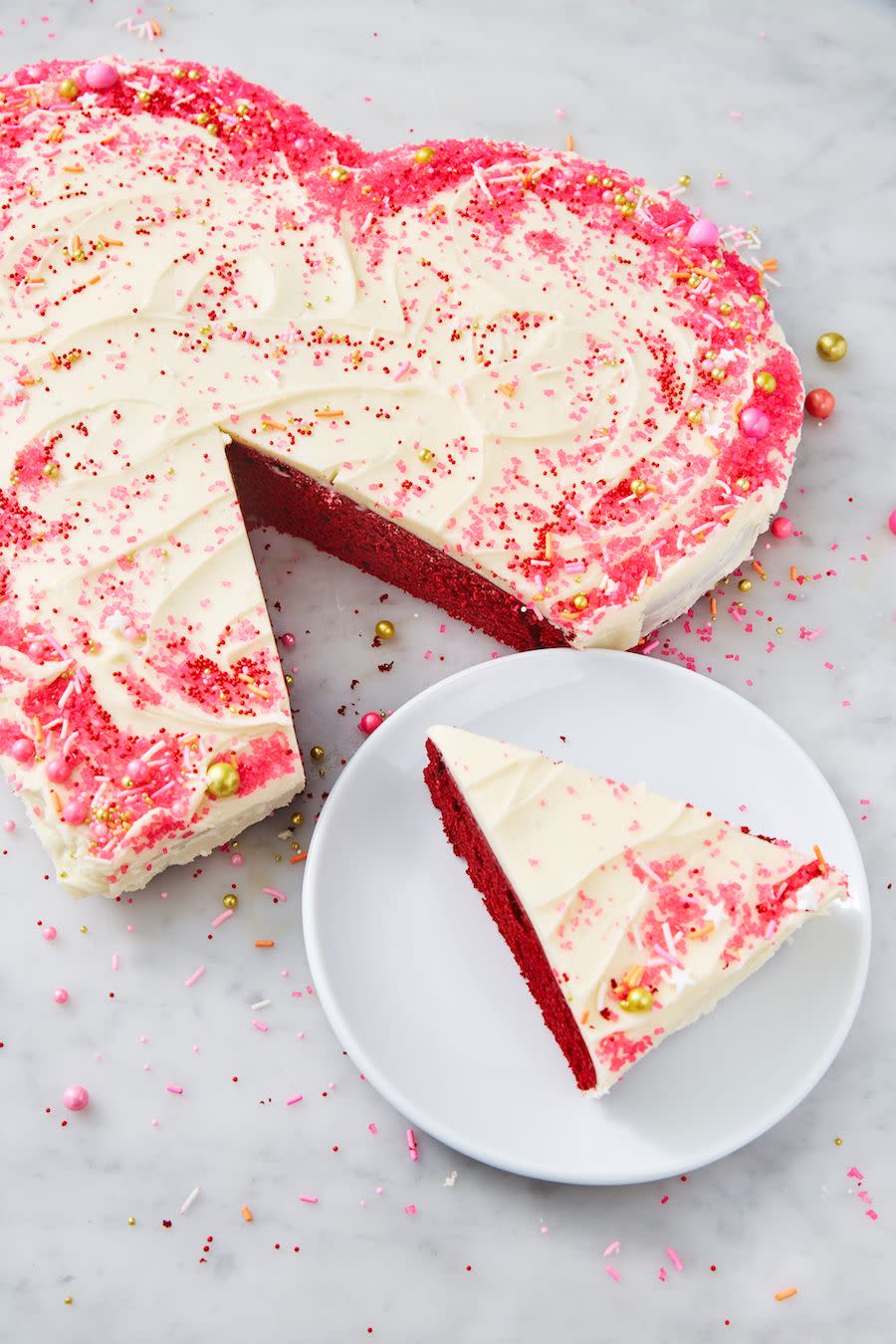 <p>This easy hack utilizes a square and round cake pan, as well as our absolute favorite <a href="https://www.delish.com/cooking/recipe-ideas/recipes/a58093/best-red-velvet-cake-recipe/" rel="nofollow noopener" target="_blank" data-ylk="slk:red velvet cake recipe;elm:context_link;itc:0;sec:content-canvas" class="link ">red velvet cake recipe</a>. If you're in a hurry, boxed cake mix works just as well! Don't sleep on the cream cheese frosting though, it makes everything 1,000x better.</p><p>Get the <strong><a href="https://www.delish.com/cooking/recipe-ideas/a25846375/heart-shaped-cake-recipe/" rel="nofollow noopener" target="_blank" data-ylk="slk:Heart-Shaped Cake recipe;elm:context_link;itc:0;sec:content-canvas" class="link ">Heart-Shaped Cake recipe</a></strong>. </p>