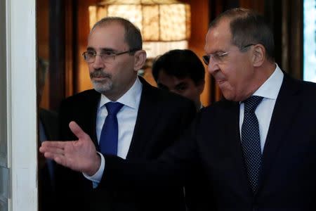 Russian Foreign Minister Sergei Lavrov and Jordanian Foreign Minister Ayman Safadi enter a hall during a meeting in Moscow, Russia July 4, 2018. REUTERS/Sergei Karpukhin