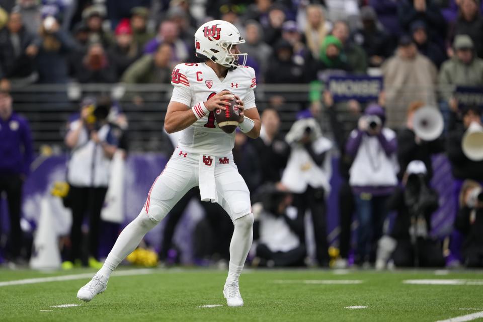 Utah quarterback Bryson Barnes looks to pass against Washington during the second half of an NCAA college football game Saturday, Nov. 11, 2023, in Seattle. | Lindsey Wasson, Associated Press