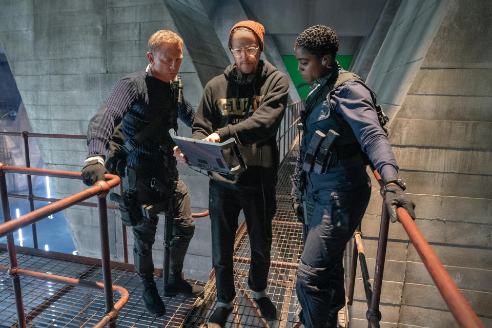 Cary Fukunaga (Director), Daniel Craig (James Bond) and Lashana Lynch (Nomi) on the 007 sound stage at Pinewood Studios from NO TIME TO DIE, a DANJAQ and Metro Goldwyn Mayer Pictures film. (Nicola Dove © 2019 DANJAQ, LLC AND MGM.  ALL RIGHTS RESERVED.) 