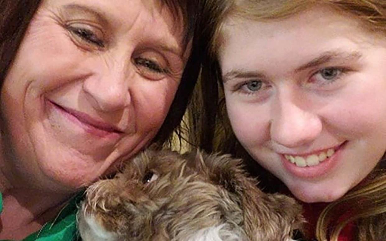 Jayme Closs was reunited with her aunt Jennifer Naiberg Smith (left) after the ordeal - AFP