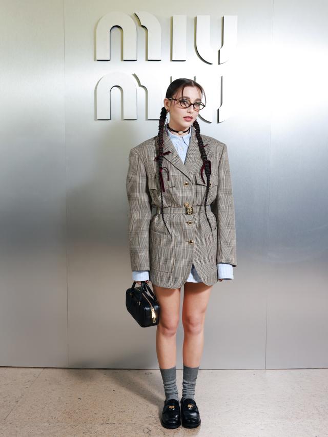 Vogue's Live Stream Correspondent Emma Chamberlain Arrives in Miu