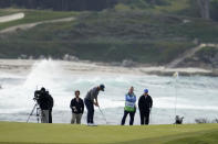 Seamus Power, of Ireland, putts on the 13th green of the Monterey Peninsula Country Club Shore Course during the third round of the AT&T Pebble Beach Pro-Am golf tournament in Pebble Beach, Calif., Saturday, Feb. 5, 2022. (AP Photo/Tony Avelar)