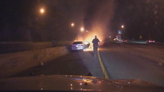 Video: Police Officers Save Man From Burning Car In Maryland
