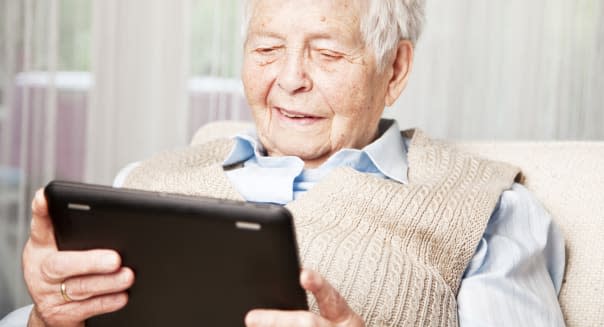 senior woman and digital tablet
