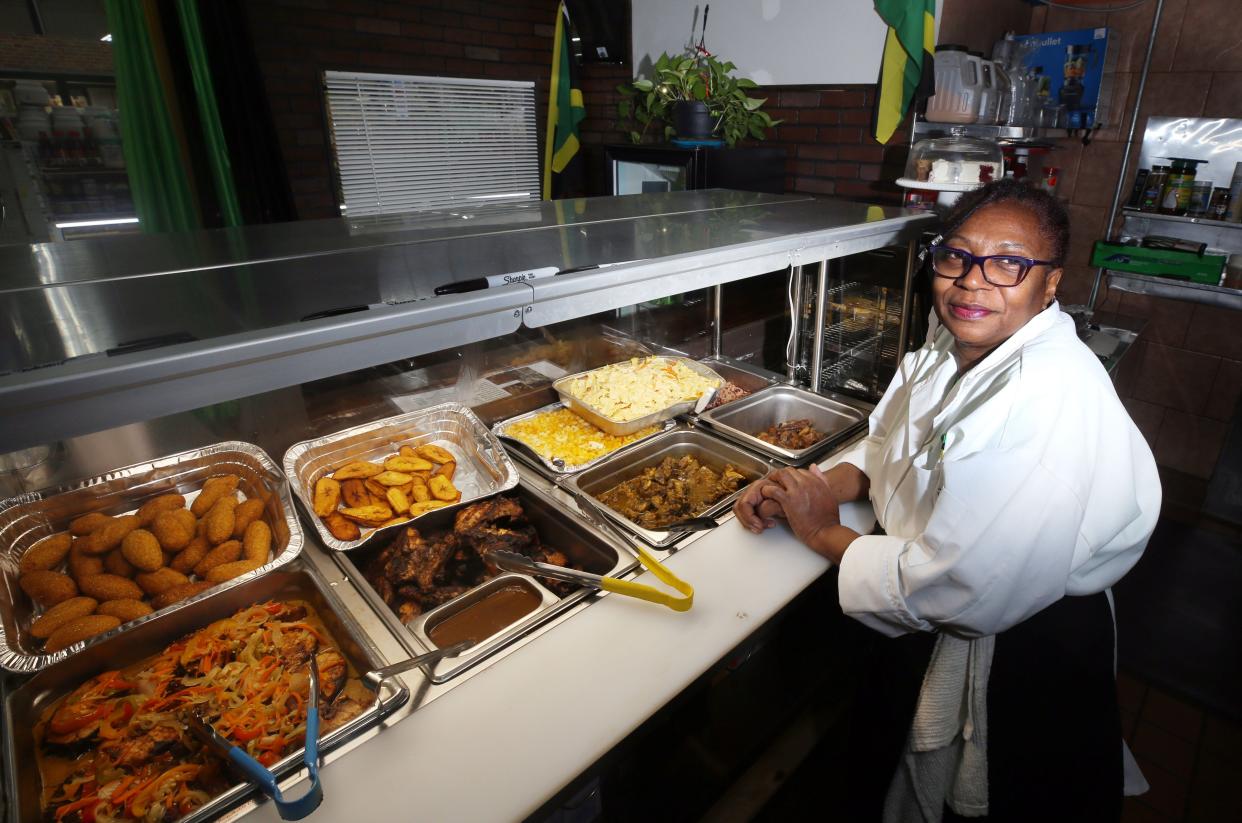 Pictured is Erica Rodriguez, owner of  Jamaican Mama Cuisine, inside the Saraga International Market. Jamaican Mama Cuisine opened May 11.