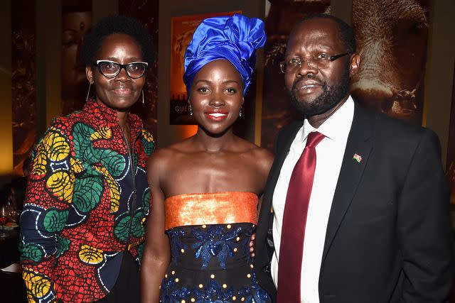 <p>Alberto E. Rodriguez/Getty</p> Dorothy Nyong'o, Lupita Nyong'o, and Peter Anyang' Nyong'o at the world premiere of Disney's 'A Queen of Katwe' as part of the 2016 Toronto Film Festival.