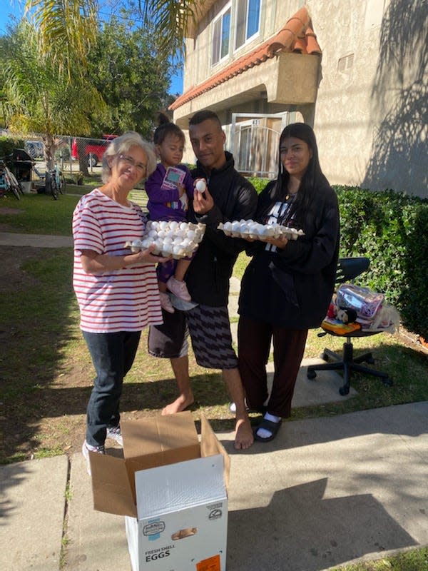 The Bellringer campaign benefited this family. From left are Ana Maria Figueroa, a friend of the family; 2-year-old Luciana Navarro; and parents Julian Navarro and Sonia El. Barrera.