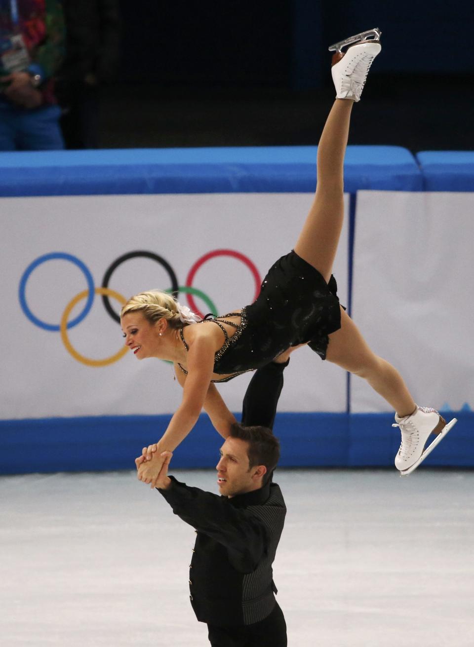 Kirsten Moore-Towers and Dylan Moscovitch of Canada compete during the Team Pairs Free Skating Program at the Sochi 2014 Winter Olympics