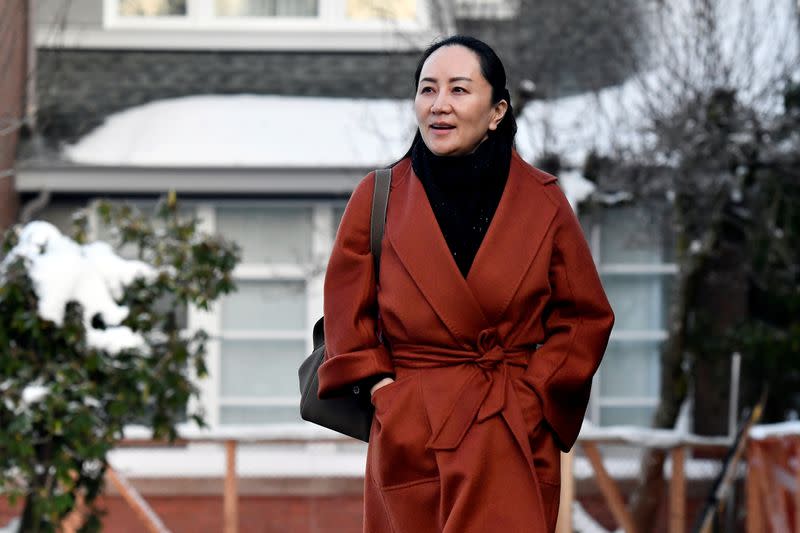 FILE PHOTO: Huawei Chief Financial Officer Meng Wanzhou leaves her home to attend a case management conference in Vancouver