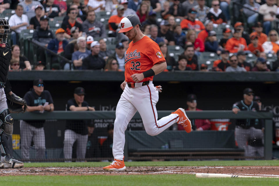 Baltimore Orioles' Ryan O'Hearn scores during a baseball game against the Arizona Diamondbacks, Saturday, May 11, 2024, in Baltimore. (AP Photo/Jose Luis Magana)