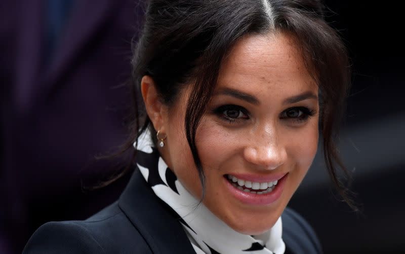 FILE PHOTO: Britain's Meghan, Duchess of Sussex, leaves after an International Women's Day panel discussion at King's College London