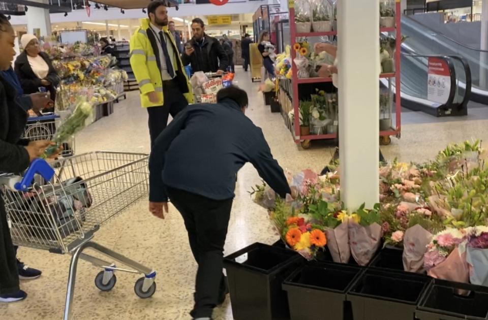 Tesco staff gave free flowers to NHS workers before they left the Tesco in Purley, Surrey. Photo: Yahoo Finance UK/Lianna Brinded