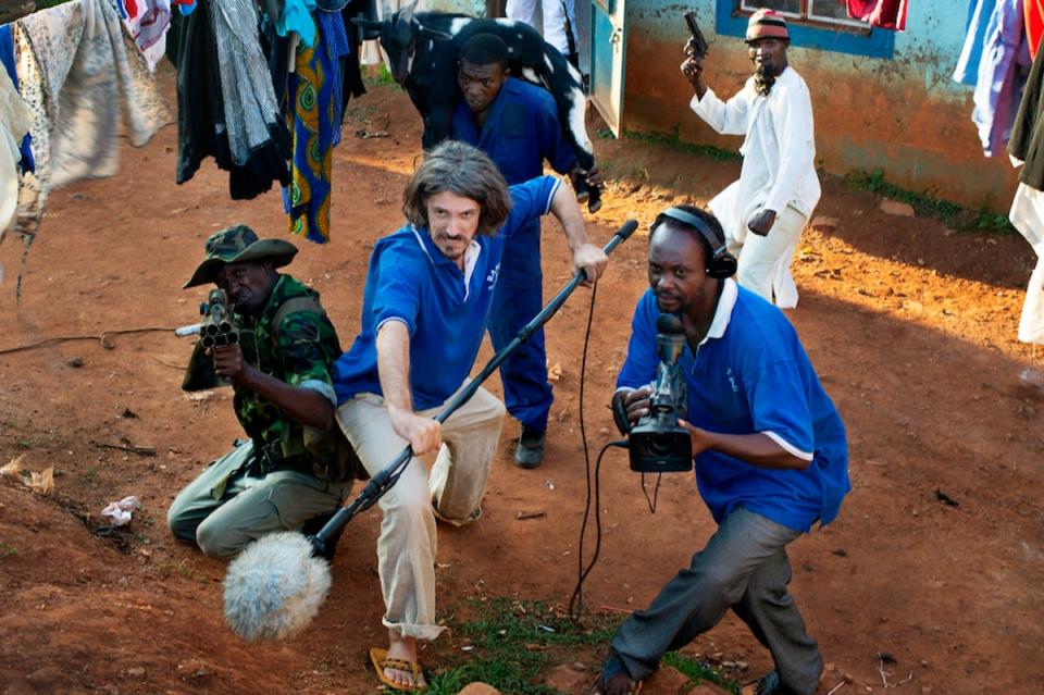 Alan Hofmanis and Isaac Nabwana in Once Upon a Time in Uganda (Blue Finch Film Releasing)