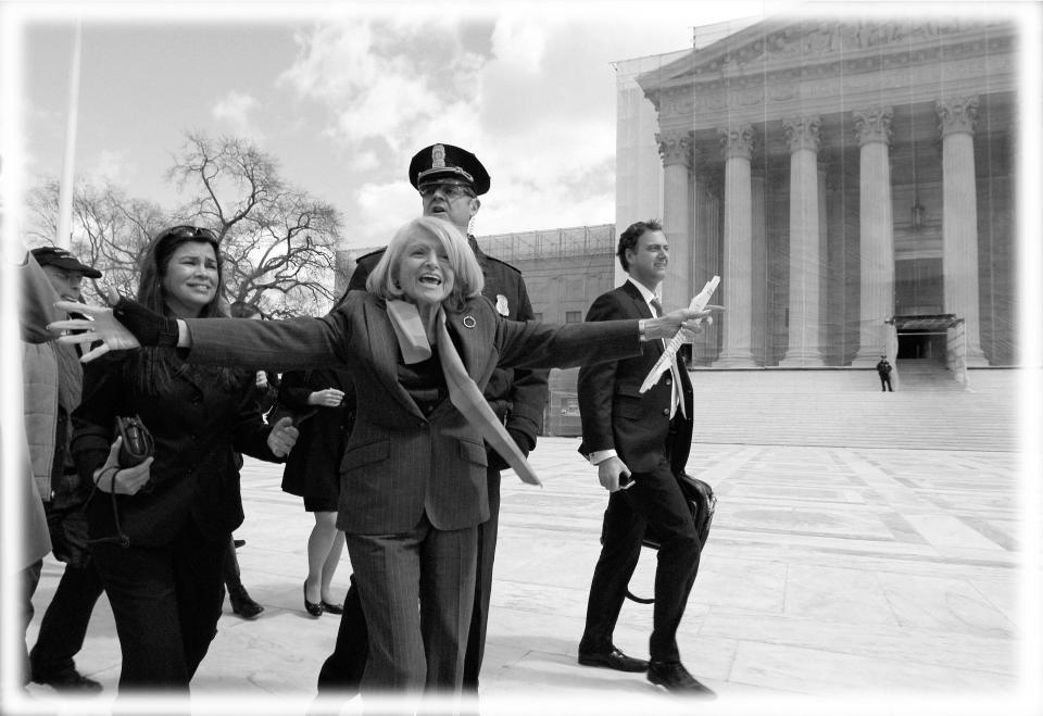 Plaintiff Edith Windsor of New York, reacts as she looks toward supporters in front of the Supreme Court in Washington, after the court heard arguments on the Defense Against Marriage Act (DOMA) on March 27, 2013.  (Photo: Jose Luis Magana/AP; digitally enhanced by Yahoo News)