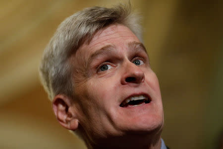 Sen. Bill Cassidy (R-LA) speaks with reporters about the Cassidy-Graham healthcare bill following the party luncheons on Capitol Hill in Washington, U.S., September 19, 2017. REUTERS/Aaron P. Bernstein