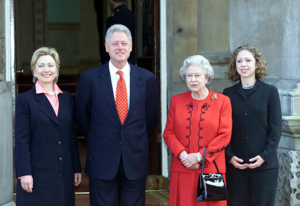 US President Bill Clinton, his wife Hillary (right) and his daughter Chelsea (left) meet Britain's Queen Elizabeth II at Buckingham Palace in London.