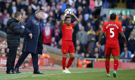 Britain Football Soccer - Liverpool v Crystal Palace - Premier League - Anfield - 23/4/17 Liverpool's Nathaniel Clyne prepares to take a throw in while Crystal Palace manager Sam Allardyce gestures Reuters / Phil Noble Livepic