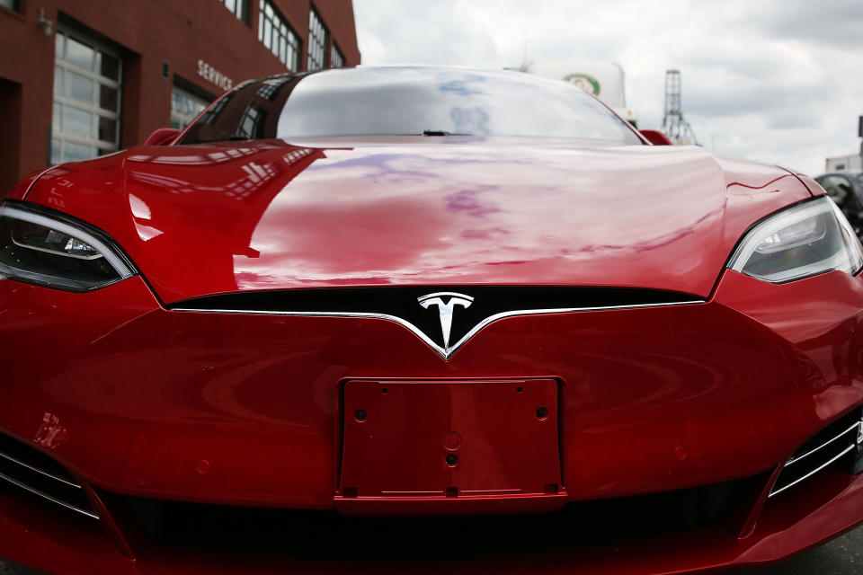 NEW YORK, NY - JULY 05: A Tesla model S sits parked outside of a new Tesla showroom and service center in Red Hook, Brooklyn on July 5, 2016 in New York City. The electric car company and its CEO and founder Elon Musk have come under increasing scrutiny following a crash of one of its electric cars while using the controversial autopilot service. Joshua Brown crashed and died in Florida on May 7 in a Tesla car that was operating on autopilot, which means that Brown's hands were not on the steering wheel. (Photo by Spencer Platt/Getty Images)