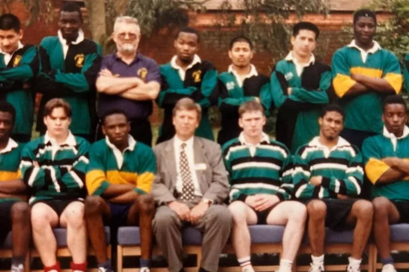 Dwaine (bottom row third from left) with the inspirational John Gunning standing behind him