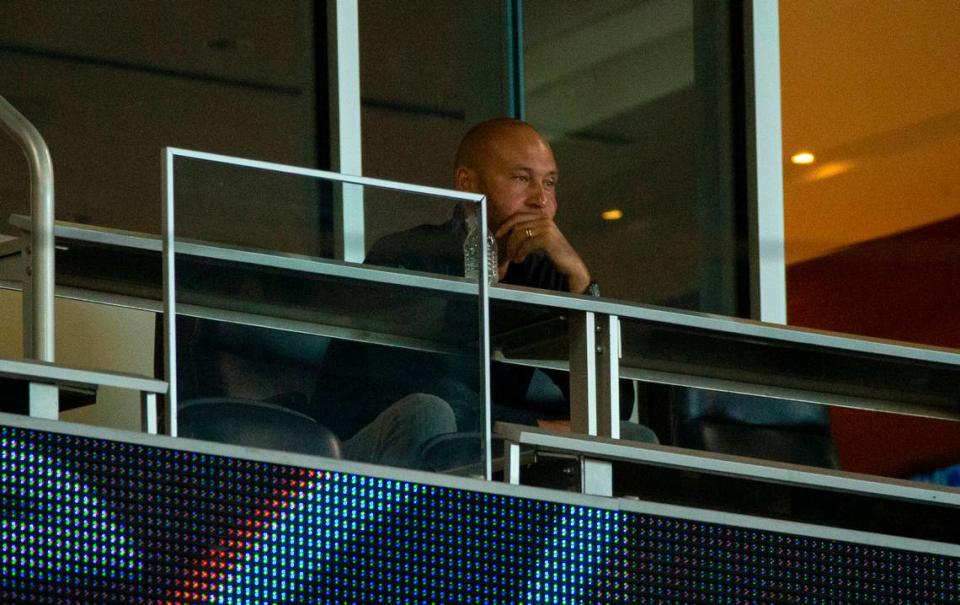 Miami Marlins part-owner and chief executive officer Derek Jeter looks from his suite during the third inning of a Major League Baseball game against the Atlanta Brave at Marlins Park in Miami on Saturday, August 15, 2020.