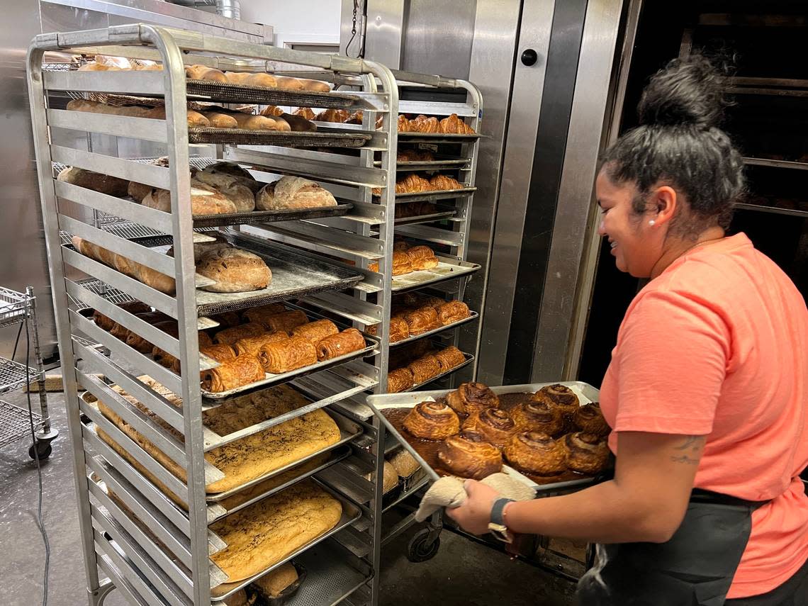 Ines Cubias prepares a rack of pastries at Sprout Momma Bakery on Hilton Head Island.