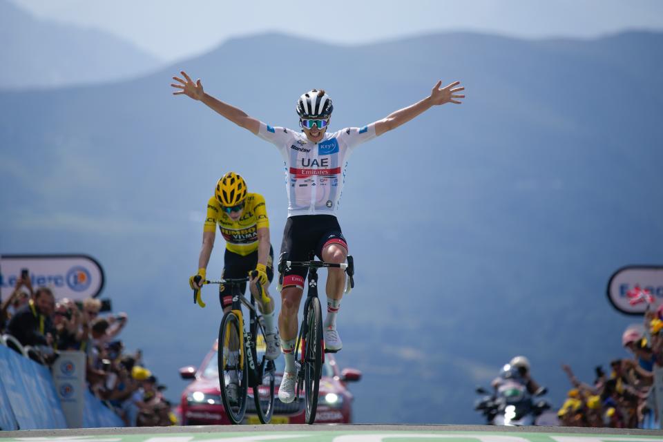 Pogacar celebrates winning stage 17 (AP)