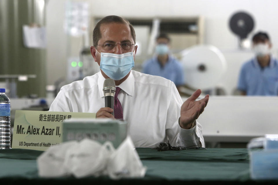 U.S. Health and Human Services Secretary Alex Azar delivers a speech after visiting a mask factory in New Taipei City, Taiwan, Wednesday, Aug. 12, 2020. Wednesday is the last day of Azar's schedule during the highest-level visit by an American Cabinet official since the break in formal diplomatic ties between Washington and Taipei in 1979. (AP Photo/Chiang Ying-ying)