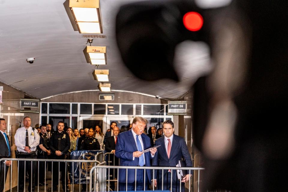 Former U.S. President Donald Trump speaks to the media with attorney Todd Blanche (R) after his trial for allegedly covering up hush money payments at Manhattan Criminal Court on May 20, 2024 in New York City. (Getty Images)