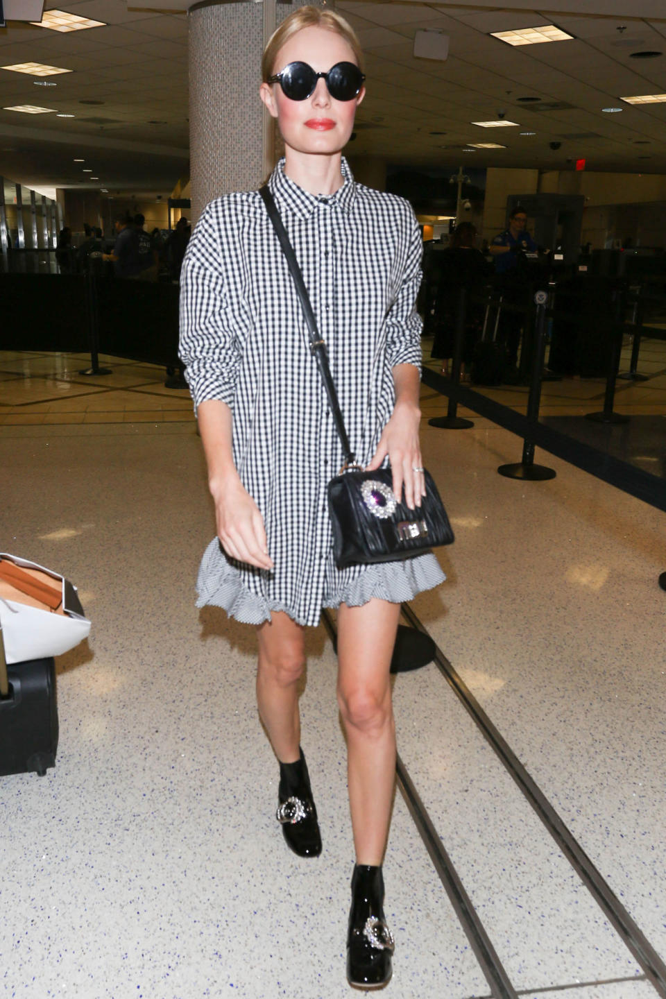 <p><strong>9 September</strong> Kate Bosworth was spotted at LAX airport wearing a simple checked monochrome dress with oversized sunglasses. </p>