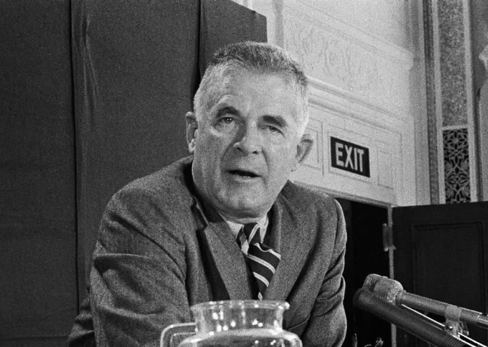 FILE - In this Oct. 20, 1973 file photo, Archibald Cox speaks at a news conference in Washington. Comparisons to the Nixon-era “Saturday night massacre” were swift after President Donald Trump fired the acting attorney general for refusing to enforce his executive order on immigrants and refugees. In both cases, a dispute between a president and his Justice Department led to an evening maneuver by the president to install an acting attorney general more to his liking. (AP Photo/John Duricka, File)