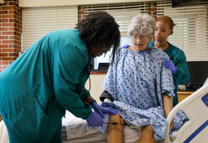 Florida A&amp;M University students make observations and work in the FAMU School of Nursing's simulation lab.