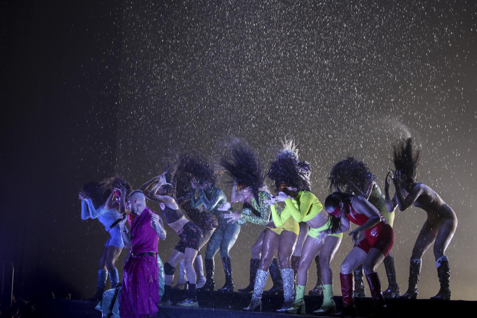 Maluma, left, performs at the European MTV Awards in Budapest, Hungary, Sunday, Nov. 14, 2021. (Photo by Vianney Le Caer/Invision/AP)