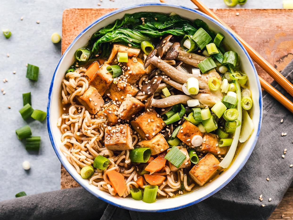 Bowl of vegan miso ramen with tofu and mushrooms