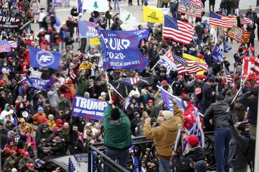 Protesters gather outside the U.S. Capitol, Wednesday, Jan 6, 2021. (AP Photo/Andrew Harnik)