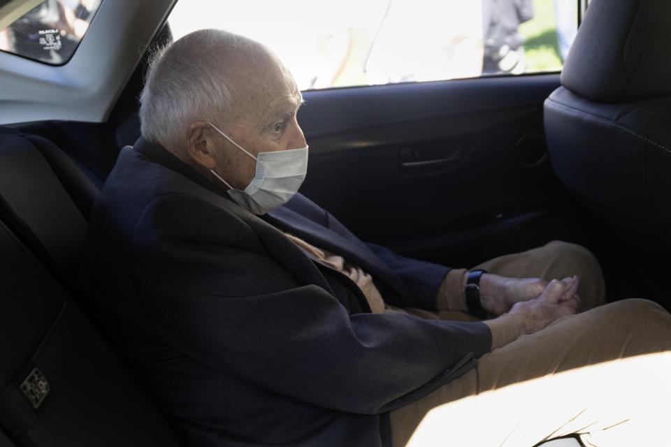 Former Cardinal Theodore McCarrick sits in a car as he leaves Dedham District Court after his arraignment, Friday, Sept. 3, 2021, in Dedham, Mass. McCarrick has pleaded not guilty to sexually assaulting a 16-year-old boy during a wedding reception in Massachusetts nearly 50 years ago. (AP Photo/Michael Dwyer)