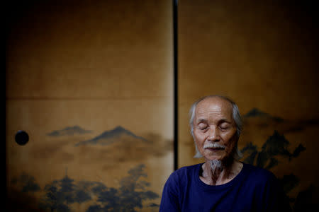 Kenzo Ito closes his eyes during an interview with Reuters at his house at Sennari district in Sakura, Chiba Prefecture, Japan, August 28, 2018. REUTERS/Kim Kyung-Hoon