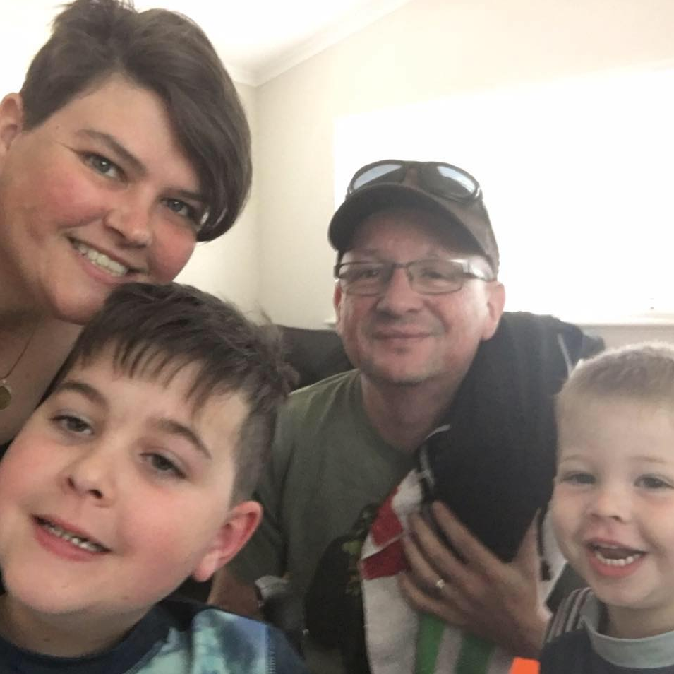 Photo of Perth family Amy, Luke, Logan (left) and Flynn (right) who are battling a health crisis.