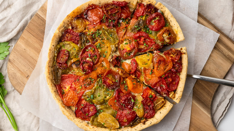 cheddar tomato pie on plate