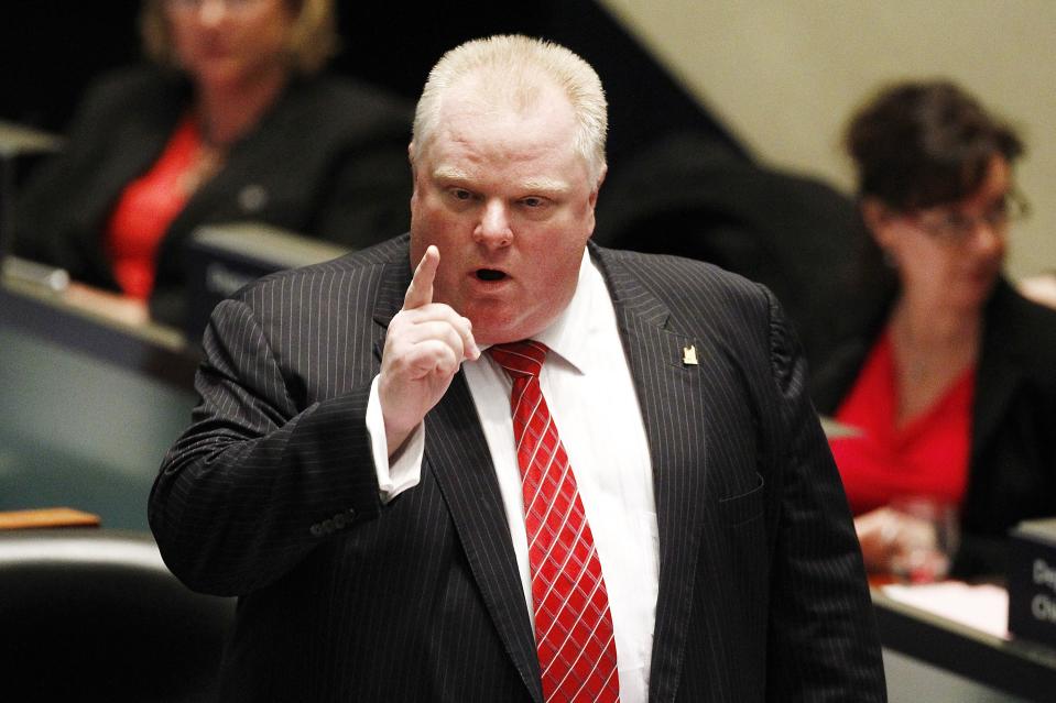 Toronto Mayor Rob Ford gestures during a special council meeting at City Hall in Toronto