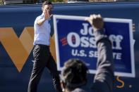 FILE - In this Dec. 21, 2020, file photo Democratic U.S. Senate challenger Jon Ossoff during a rally in Columbus, Ga. with Vice President-elect Kamala Harris and fellow Democratic U.S. Senate challenger the Rev. Raphael Warnock. (AP Photo/Ben Gray, File)