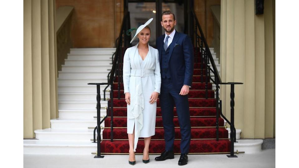 England football captain and Tottenham Hotspur player Harry Kane with his partner Kate Goodland arrive for his investiture ceremony at Buckingham Palace on March 28, 2019 in London, England