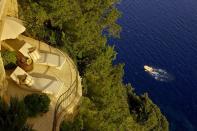 <p><b>4. Caesar Augustus</b></p>Located in Capri, Italy, Caesar Augustus is classified as one of the best hotels in the world and is ranked at number four. Apart from offering one of the most spectacular vistas on the isle of Capri, the hotel views include breathtaking scenery of Mount Vesuvius, Sorrento, Ischia, and unique scenes of the island.<p>Readers’ Choice Rating: 98.6</p><p>Room: 100</p><p>Service: 98.8</p><p>Food: 97.6</p><p>Location: 95.2</p><p>Design: 98.8</p><p>Activities: 96.4</p><p>(Image source: Hotel Website)</p>