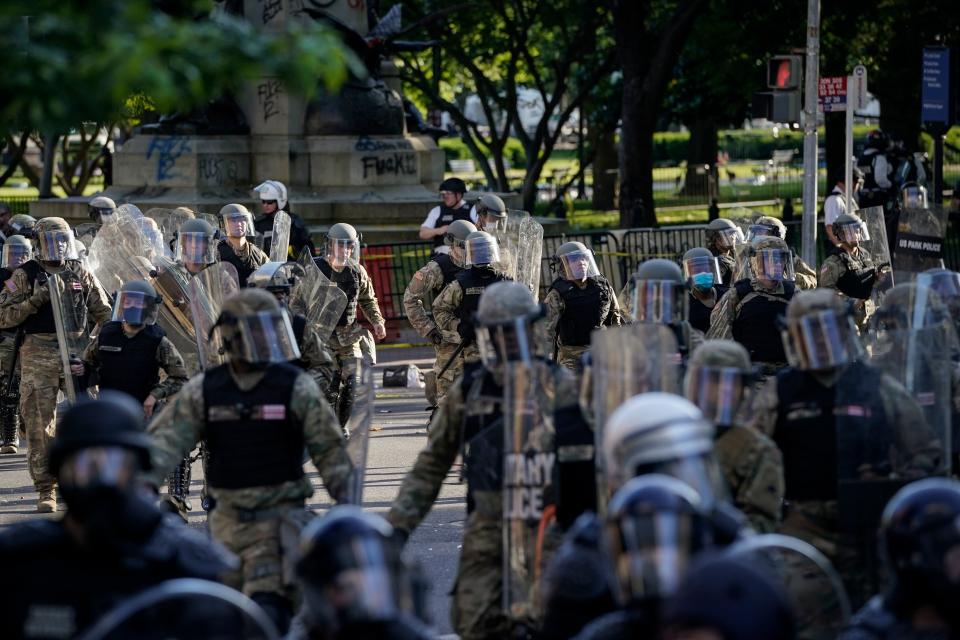 Law enforcement officers mobilizes to clear the path of protesters for Donald Trump's photo-op with a Bible on June 1. (Drew Angerer via Getty Images)